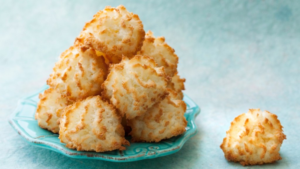 Coconut macaroons stacked on a plate